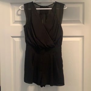 Black Doe and Rae romper. Size M. Only worn once.